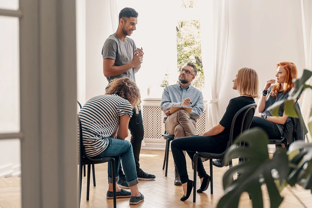 Supportive group therapy environment reducing isolation in treatment