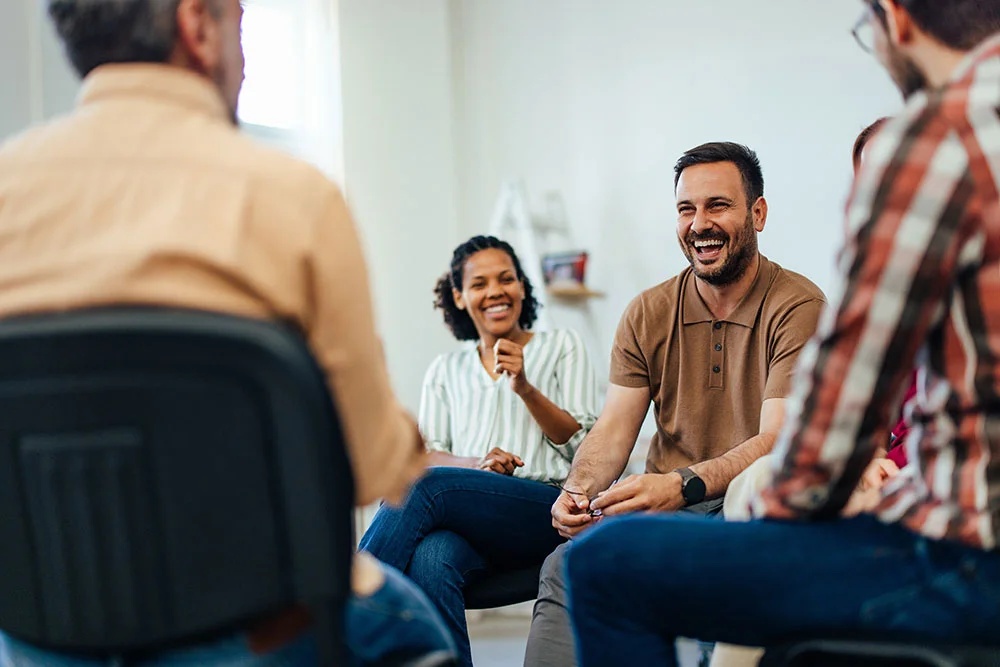 Group therapy session for part-time day treatment in Massachusetts, focusing on recovery and mental health support.